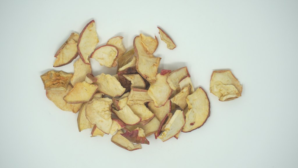 Unsulphured low-moisture apple chips with red peel, top view
